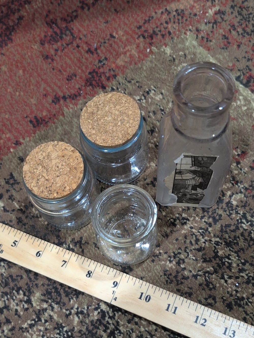 Clear Glass Jars with Cork Lids and Small Glass Bottle And Bottle With Label
